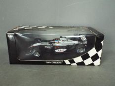 Minichamps - A boxed 1:18 scale McLaren Mercedes MP4-18 2003 test car for Alexander Wurz.