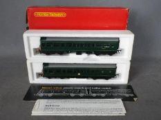 Hornby - an OO gauge diesel electric two-car set comprising power coach op no M79079 and trailer