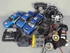 Nikko - Saicon - Zisheng - A mixed lot of 3 x radio control cars and spare parts including Saicon