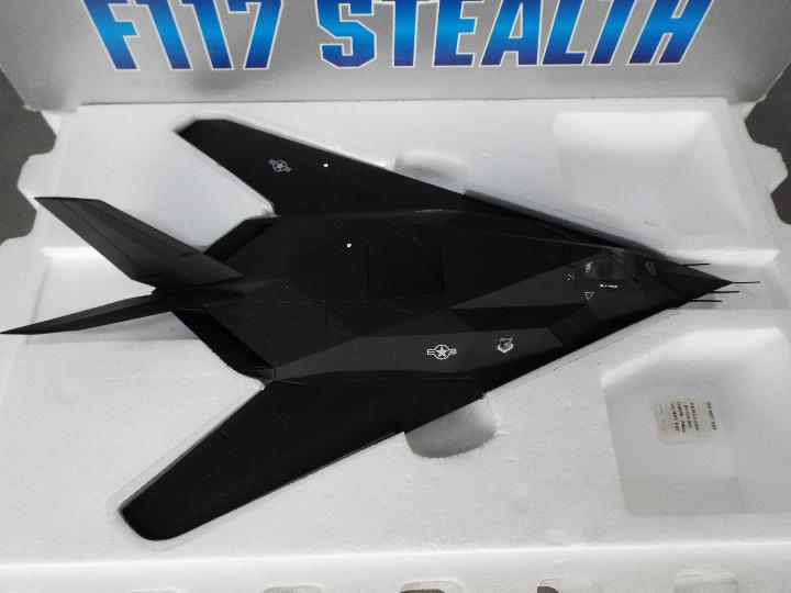 Armour Collection - A boxed 1:48 scale F117 Stealth bomber aircraft in U.S.A.F livery. #98060. - Image 2 of 2