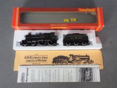 Hornby - an OO gauge County class locomotive and tender 4-4-0 'County of Oxford' op no 3830,