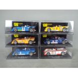 GB track - A group of 6 x Chevron B19 slot car models including Jody Scheckters 1971 car,