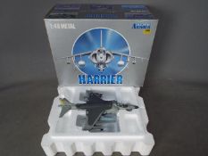 Armour Collection - A boxed 1:48 scale Harrier AV8 Plus in U.S. Marines livery. # 98051.