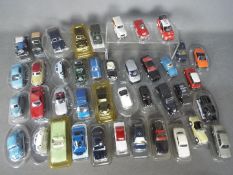 Corgi - Solido - Norev - A collection of 41 x 1:43 scale cars in plastic bubble packaging and 90 x
