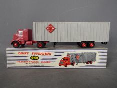 Dinky Toys - A boxed Dinky Toys # 948 Tractor - Trailer 'Maclean'.