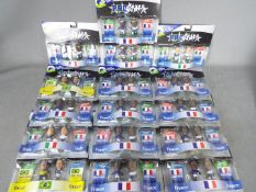 Corinthian - A squad of 16 Corinthian Pro Stars 2 Pack carded football figures.