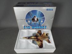 Armour Collection - A boxed 1:48 scale F18 Hornet in U.S. Navy Top Gun livery. # 98015.