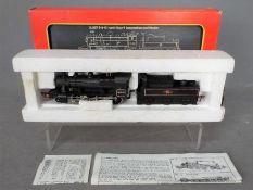 Hornby - an OO gauge Ivatt class locomotive and tender 2-6-0 op no 46400, black BR livery # R857,