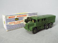 Dinky Toys - A boxed Dinky Toys #689 Medium Artillery Tractor with both spare tyres in rear plus