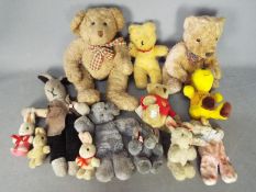 Browning, Others - A collection of 13 teddy bears and soft toys in a variety of sizes and colours.