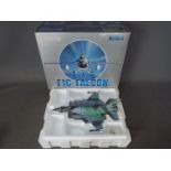 Armour Collection - A boxed 1:48 scale F16 Falcon in U.S. Navy Top Gun livery. # 98021.