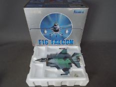 Armour Collection - A boxed 1:48 scale F16 Falcon in U.S. Navy Top Gun livery. # 98021.