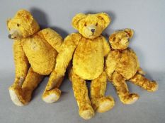 Unconfirmed Makers - A family of three unmarked vintage teddy bears.
