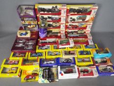 Lledo - Over 30 boxed Lledo diecast model vehicles in various scales.