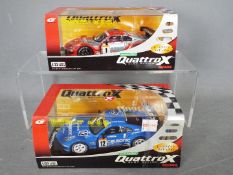 Scalextric - Takara - 2 x Nismo Nissan 350 Z slot cars from the Quattro X range, # QX01, # QX02.