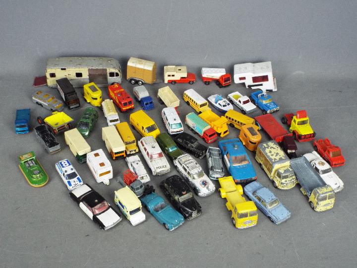 Corgi Toys, Dinky Toys, Matchbox - A collection of unboxed diecast model vehicles in various scales.