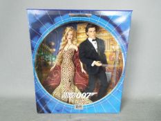 Mattel - Barbie - James Bond - A boxed collectors edition James Bond Ken and Barbie gift set.
