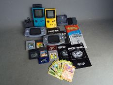 Nintendo - Game Boy - A collection of 4 x vintage Game Boy consoles and games.