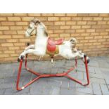 Mobo - A vintage Mobo Prairie King rocking horse on springs.