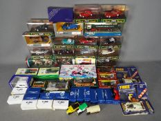 Corgi - A collection of over 30 predominately boxed diecast model vehicles in various scales.