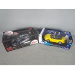 Guilloy, Maisto - Two boxed 1:18 scale diecast model cars.