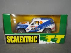 Scalextric - TT - limited edition Nissan Patrol TT 4 x 4 Dakar rally car. # 6516.