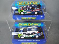 Scalextric - 2 x Ford Focus RS WRC models,