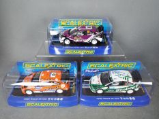 Scalextric - 3 x Ford Focus RS WRC models including two Eddie Stobart liveried cars and a 2010