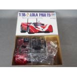 Tamiya - A boxed 1:18 scale Tamiya #10004 Lola T-160 TS plastic model kit.