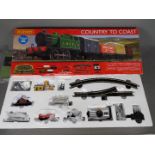 Hornby - A boxed Hornby R1201 'Country to Coast' OO gauge electric train set.