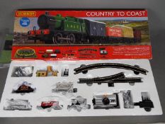 Hornby - A boxed Hornby R1201 'Country to Coast' OO gauge electric train set.