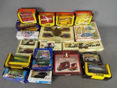 Lledo, Corgi, Bburago - 20 boxed diecast model vehicles in various scales.