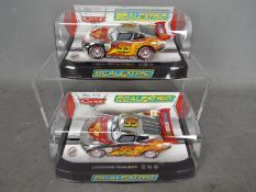 Scalextric - 2 x Pixar Cars Lightning McQueen models in the rare chrome finish,