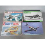 Revell, Hasegawa, Hobby Craft - Four boxed military aircraft plastic model kits in various scales.