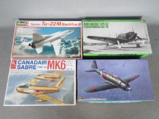 Revell, Hasegawa, Hobby Craft - Four boxed military aircraft plastic model kits in various scales.