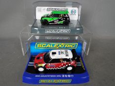 Scalextric - 2 x Mini models, a Countryman WRC driven by Kris Meeke,