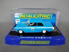 Scalextric - A Ford Cortina MkI racing car in blue. # C3307.