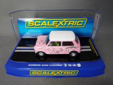 Scalextric - A limited edition Morris Mini Cooper in pink. C3224.