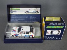 Scalextric - Limited edition Peugeot 205T16 rally car as driven by Timo Salonen.