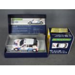 Scalextric - Limited edition Peugeot 205T16 rally car as driven by Timo Salonen.