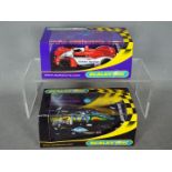 Scalextric - 2 x Lister Storm LMP Le Mans cars, the 2003 and 2004 versions. # C2521, # C2658.