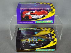 Scalextric - 2 x Lister Storm LMP Le Mans cars, the 2003 and 2004 versions. # C2521, # C2658.