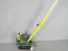 Marx - An unboxed vintage pressed steel 'Lumar Contractors' High Lift Mobile Crane by Marx.