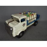 Triang - An unboxed Triang Junior Diesel Series pressed steel Milk Lorry.