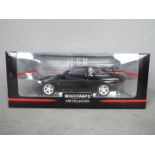 Minichamps - A boxed 1:18 scale diecast Ford Escort Cosworth 1992 by Minichamps.