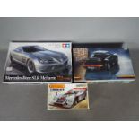 Matchbox, Fujimi, Tamiya - Three boxed plastic model car kits.