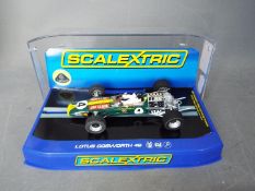 Scalextric - A 1968 Lotus Cosworth 49 as driven by Jim Clark at Kyalami. # C3206.