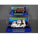 Scalextric - 2 x cars, MG Metro 6R4 in Clarion livery and Mini Countryman WRC model.