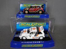 Scalextric - 2 x cars, MG Metro 6R4 in Clarion livery and Mini Countryman WRC model.