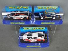 Scalextric - 3 x cars, a limited edition Mini Cooper and 2 x McLaren MP4-12C race cars.